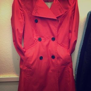 Bright red, light-weight, trench coat.
